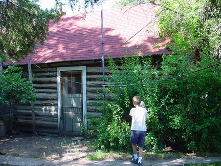 Thomas Sly house moved from across creek